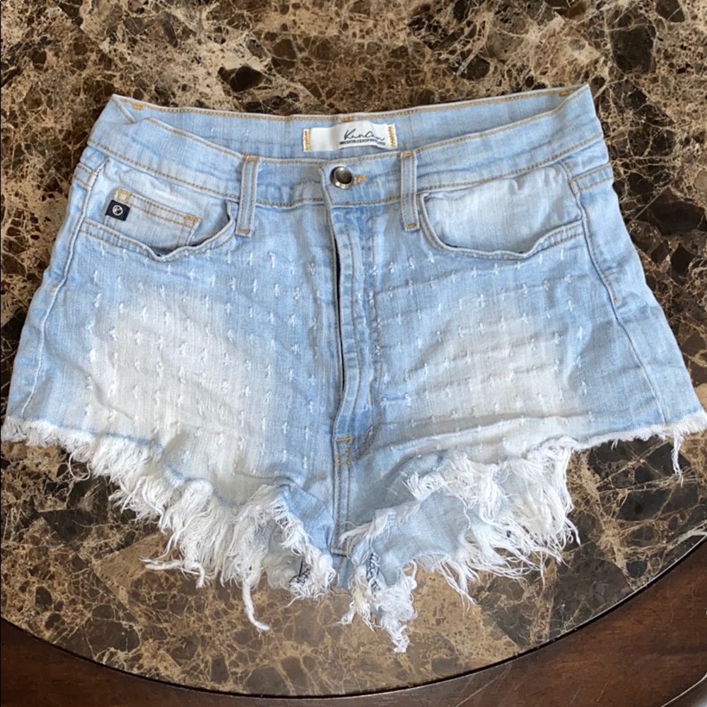 distressed blue jean shorts